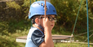 Image Showing a young boy wearing a safety helmet