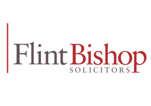 Flint Bishop Solicitors logo - Red vertical line on the left followed by the word Flint in Grey, Bishop in Red and Solicitors in Grey underneath the word Bishop